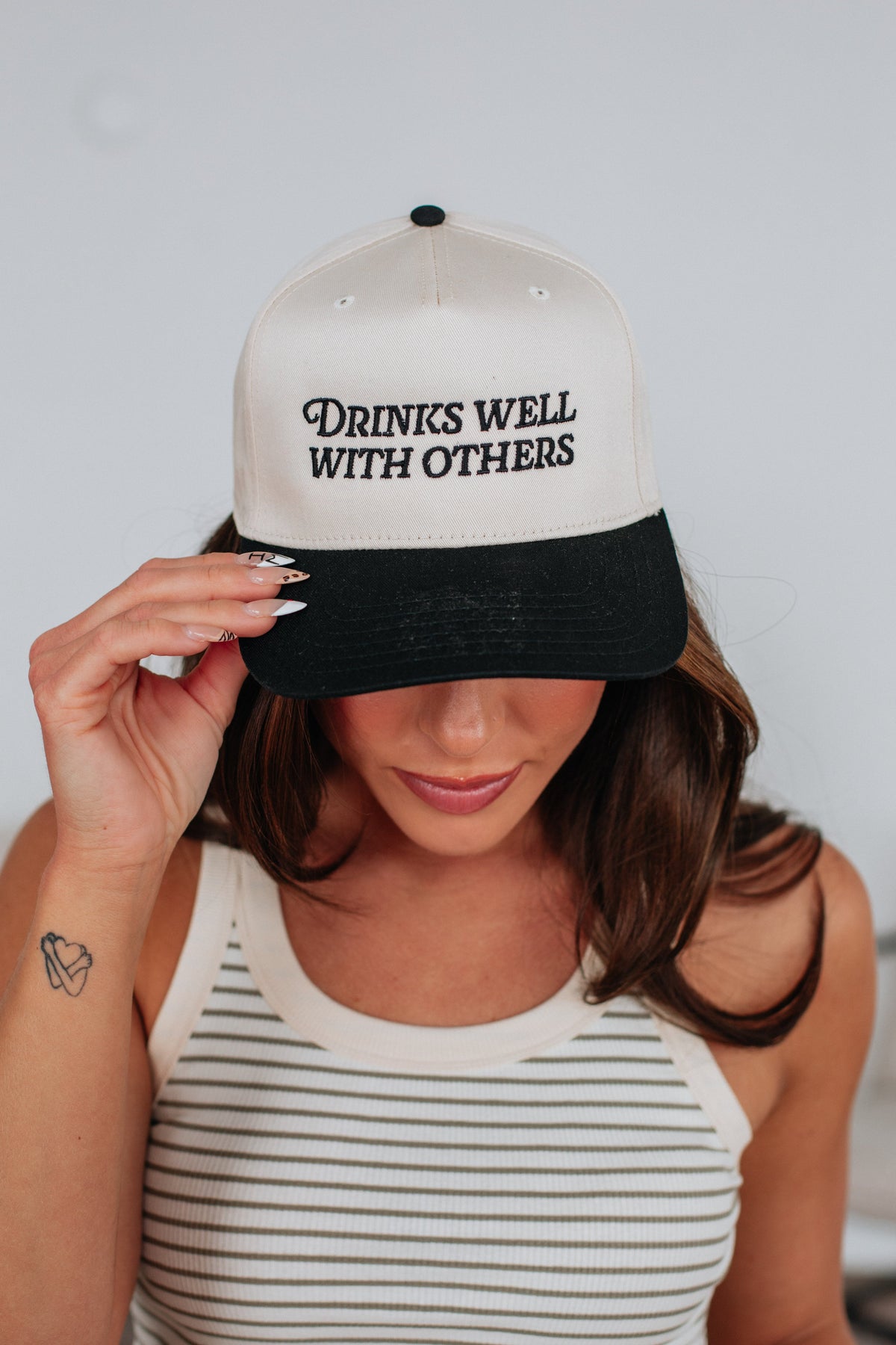 Drinks Well With Others Trucker Hat